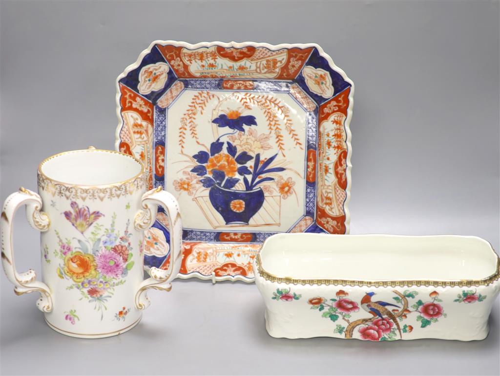 A Dresden porcelain three handled cup, an Imari dish and one other dish